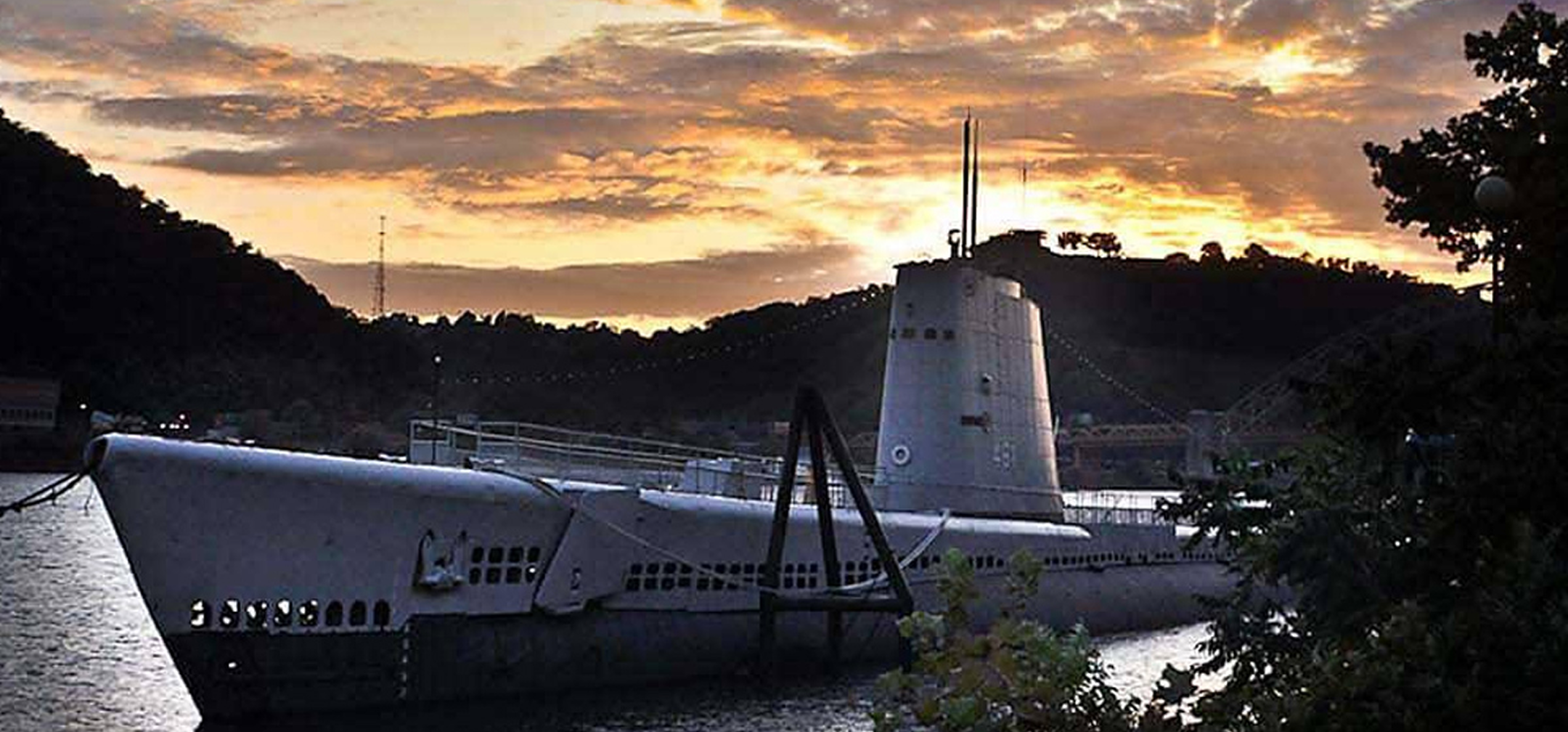 USS Requin (SS 481) submarine at sunset